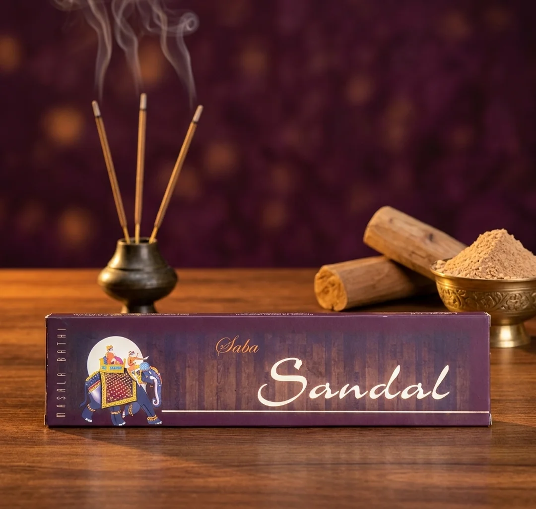Saba Sandal masala bathi box with sandalwood logs, sandalwood powder and lit incense sticks